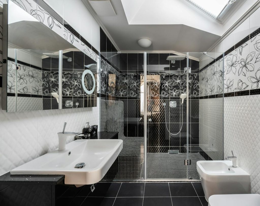 Stylish contemporary bathroom interior with black and white design elements.
